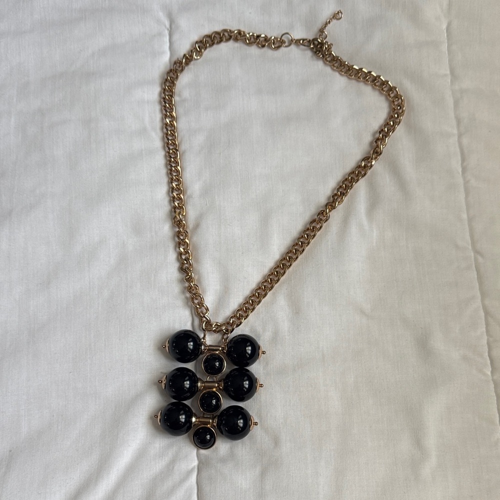Elegant Gold and Black Necklace